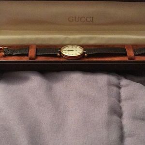 Vintage Gucci Red trim Gold Watch